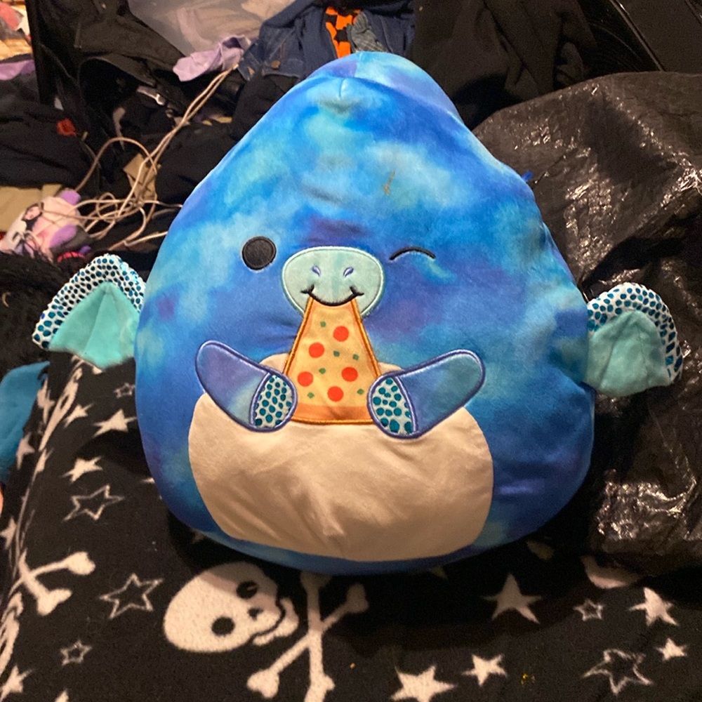 Squishmallow dinosaur eating pizza plush